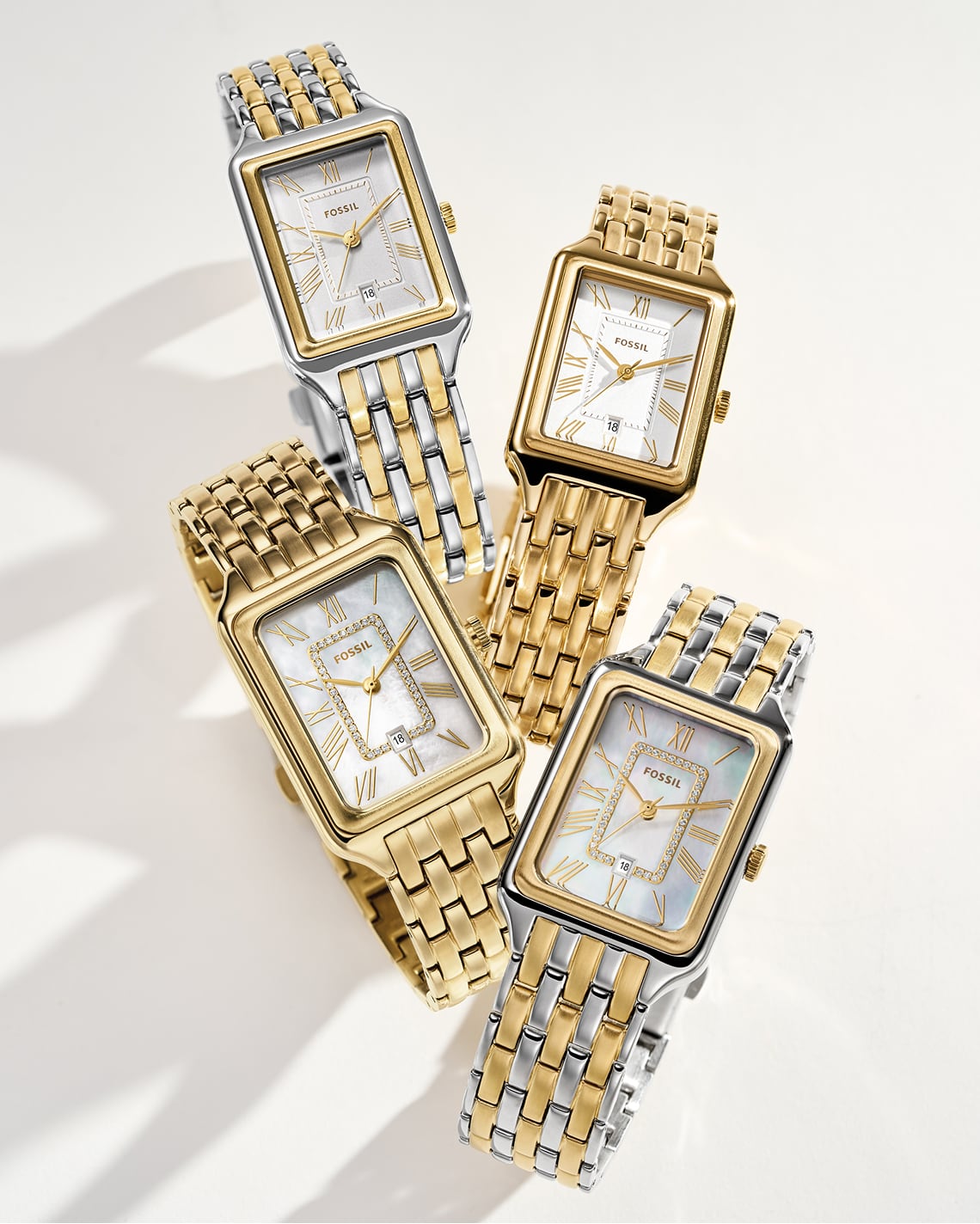 Three gold-tone pieces of Fossil's Raquel collection, including a necklace, bracelet and watch featuring an engraving on the back that reads 'I REALLY DO'