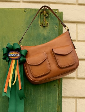 Brown leather shoulder bag by Fossil.
